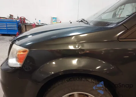 2014 Dodge Grand Caravan Sxt z USA, uszkodzony, nr VIN 2C4RDGCG7ER313654